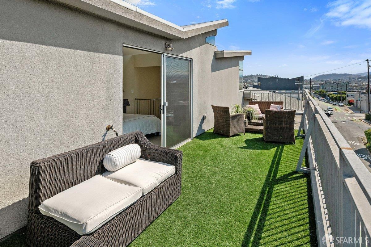 1325 Indiana Street, Unit 301 San Francisco, CA 94107 - Photo 28 of 41 a view of a patio with couches chairs and a yard
