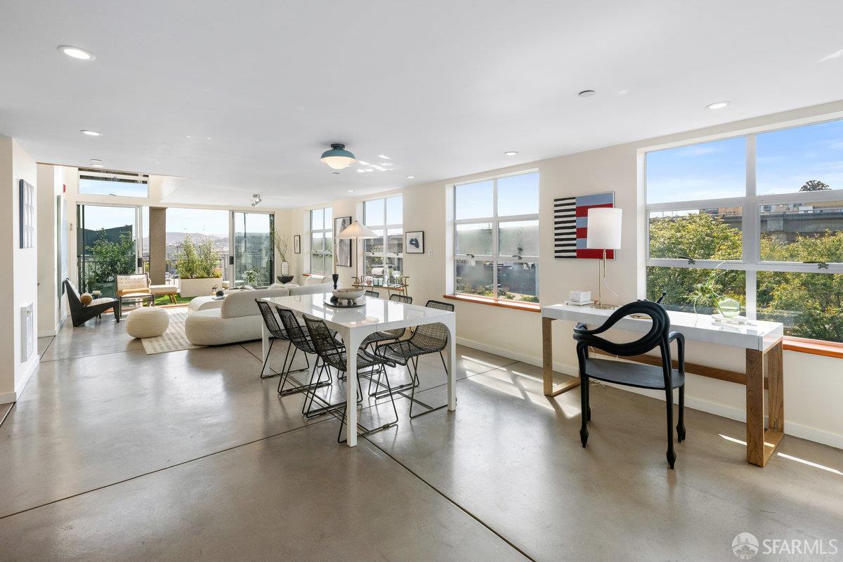 1325 Indiana Street, Unit 301 San Francisco, CA 94107 - Photo 3 of 41 a living room with furniture a window and a table