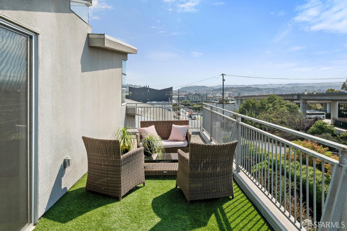1325 Indiana Street, Unit 301 San Francisco, CA 94107 - Photo 34 of 41 a view of a roof deck with a table and chairs