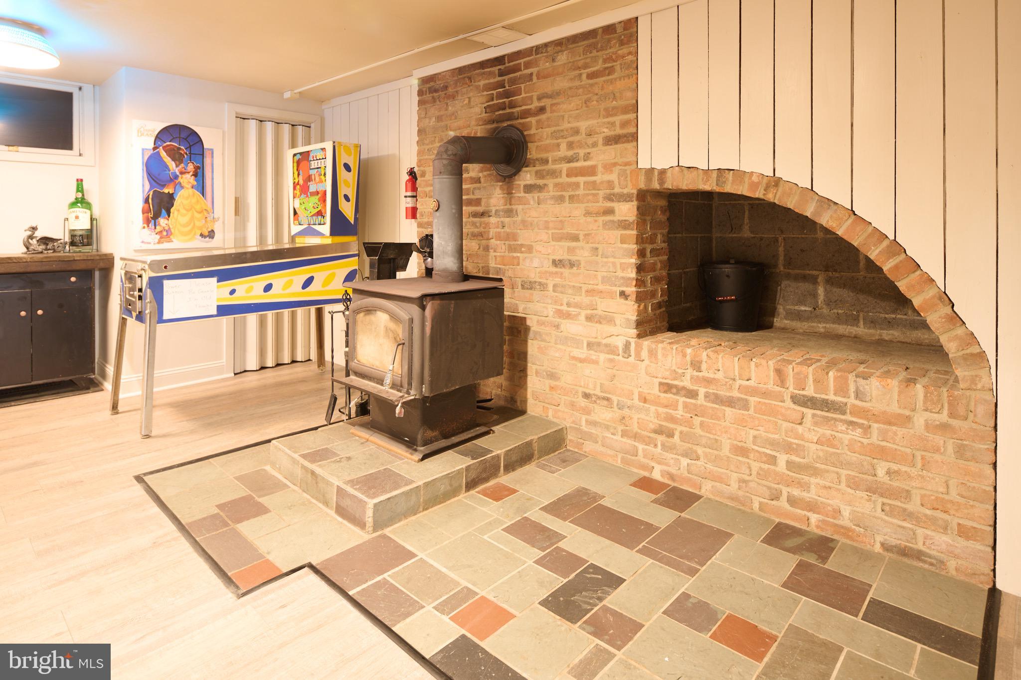 1612 Elizabeth Road State College, PA 16801 - Photo 46 of 71 Warm up on cold or dreay days by the wood stove