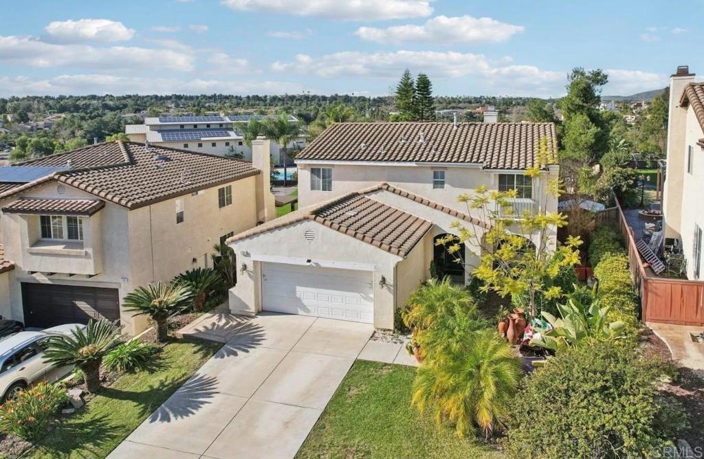 1234 Old Janal Ranch Road Chula Vista, CA 91915 - Photo 6 of 34 a view of a house with a yard and sitting area