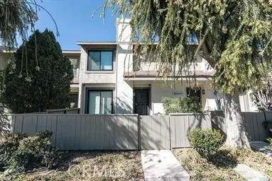 a view of a house with a garden