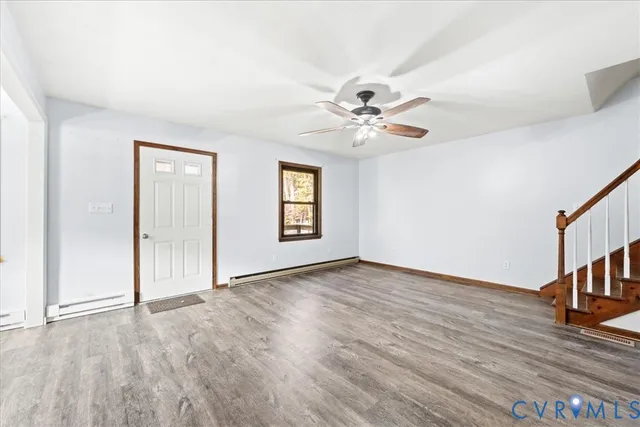 a bathroom with a toilet a sink and a mirror