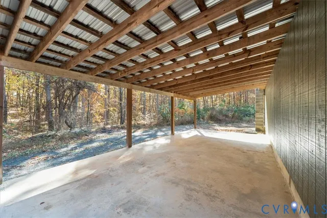 a view of a room with wooden walls