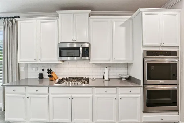 a bedroom with a bed and closet