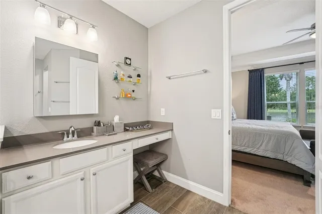 a view of a house with backyard and a garden