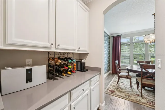 an aerial view of residential houses with outdoor space and river