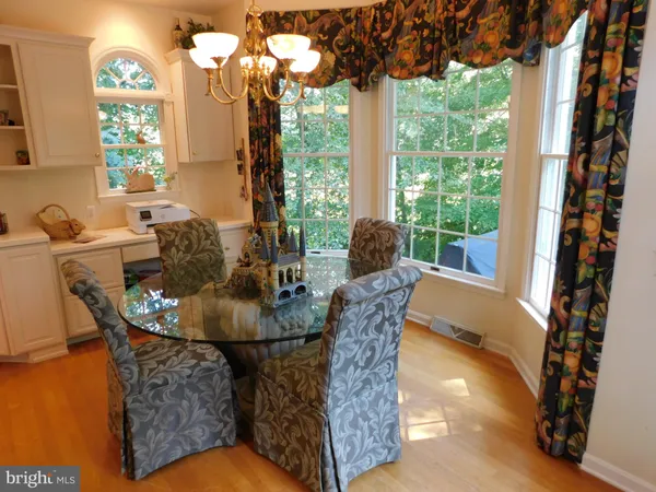a view of a living room and dining room