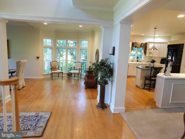 a living room with a fireplace and a flat screen tv