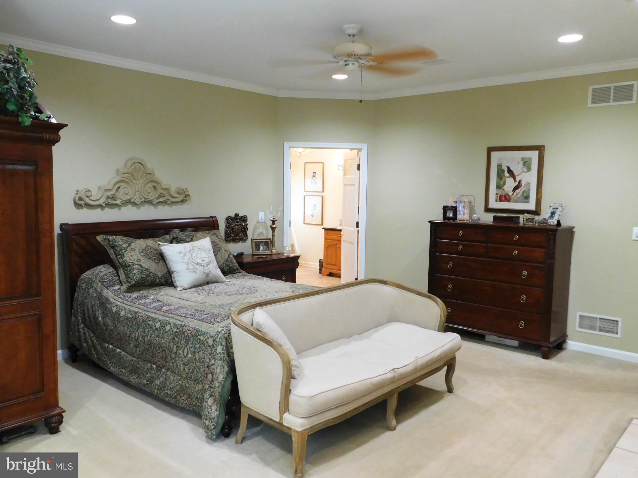 28 Baltray Road Dover, DE 19904 - Photo 29 of 73 a bedroom with a bed and painting on the wall