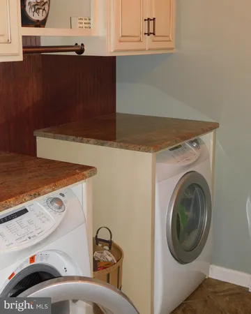 a view of a workspace with bookshelf