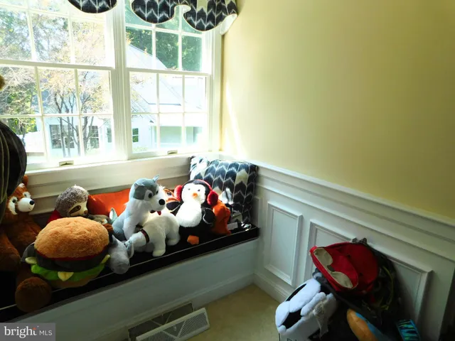 a view of a tree in a yard