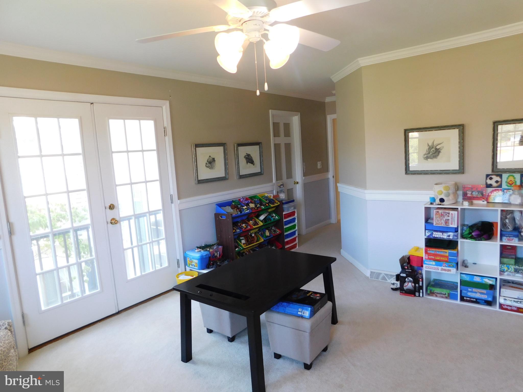 28 Baltray Road Dover, DE 19904 - Photo 49 of 73 a view of a workspace with furniture and a window
