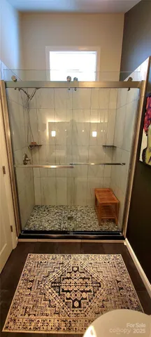 a bathroom with a double vanity sink and a toilet