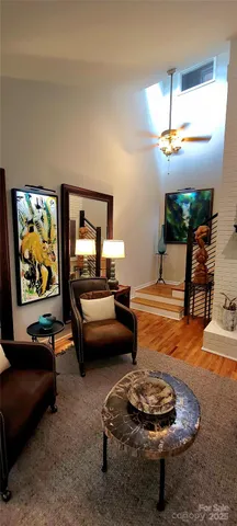 a kitchen with stainless steel appliances granite countertop a refrigerator sink and cabinets