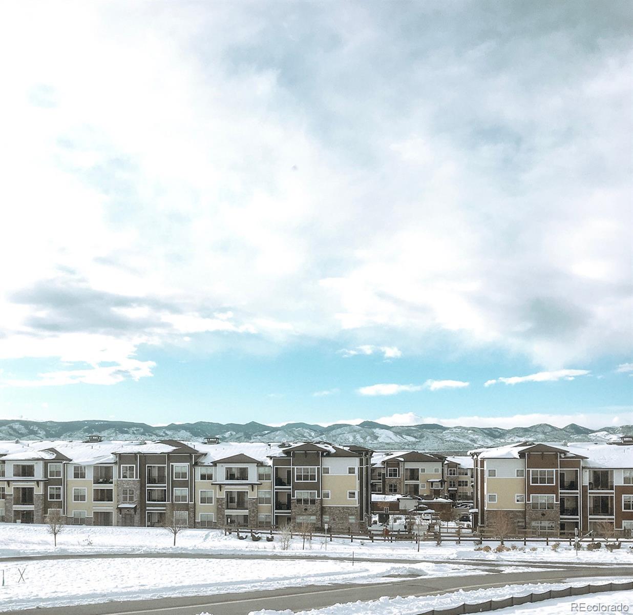 8334 Farmers Way Highlands Ranch, CO 80129 - Photo 2 of 4 a view of large building with a city view