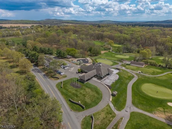 an aerial view of a house with garden