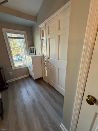 wooden floor and window in an empty room