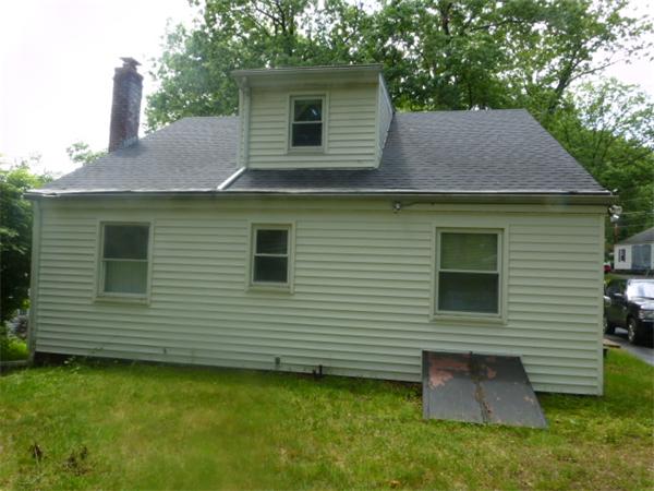 30 Mason Road Dudley, MA 01571 - Photo 2 of 18 a view of a house with a backyard