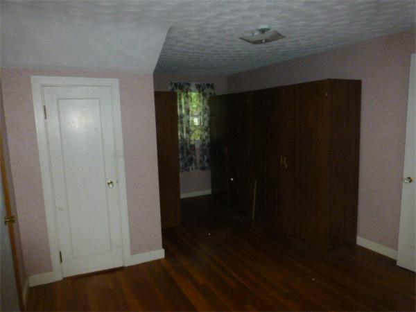 30 Mason Road Dudley, MA 01571 - Photo 5 of 18 a view of hallway with windows and wooden floor