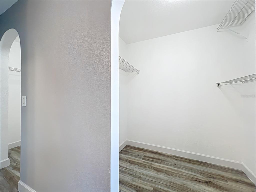 11963 Bentry Street Orlando, FL 32824 - Photo 55 of 80 a view of small space with racks on the wall