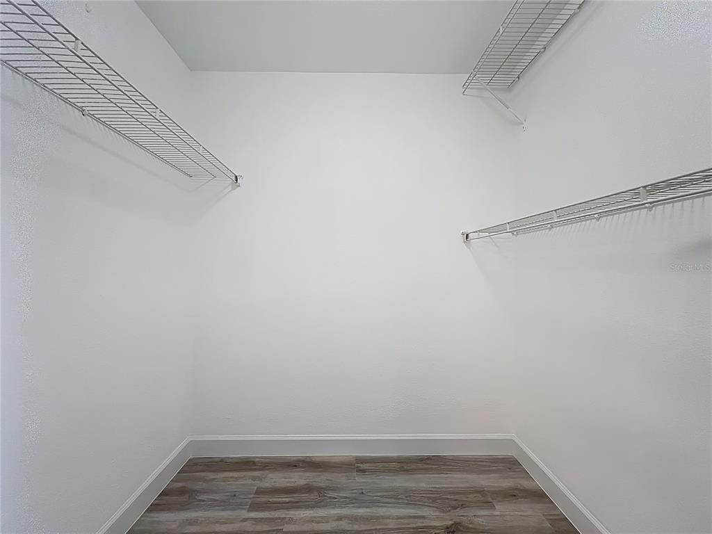 11963 Bentry Street Orlando, FL 32824 - Photo 56 of 80 a view of an empty walk in closet