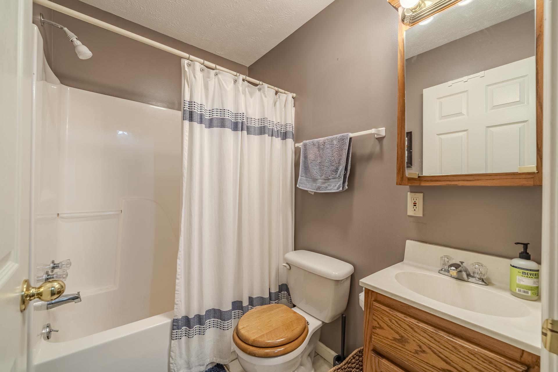405 Murray Lane Counce, TN 38326 - Photo 24 of 36 a white toilet sitting next to a bathroom sink and tub
