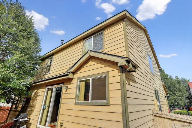a view of a house with a street
