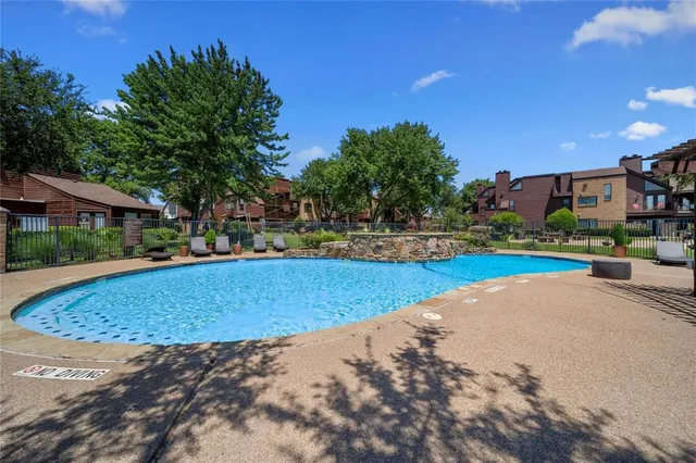 a view of outdoor space yard and swimming pool