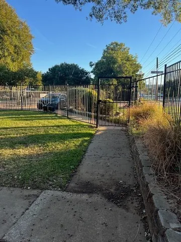 a view of a park with a big yard