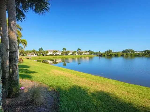 a view of a city with a lake