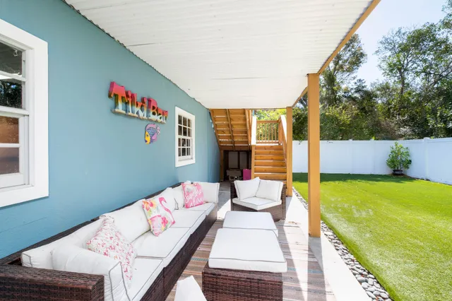 a balcony with seating area