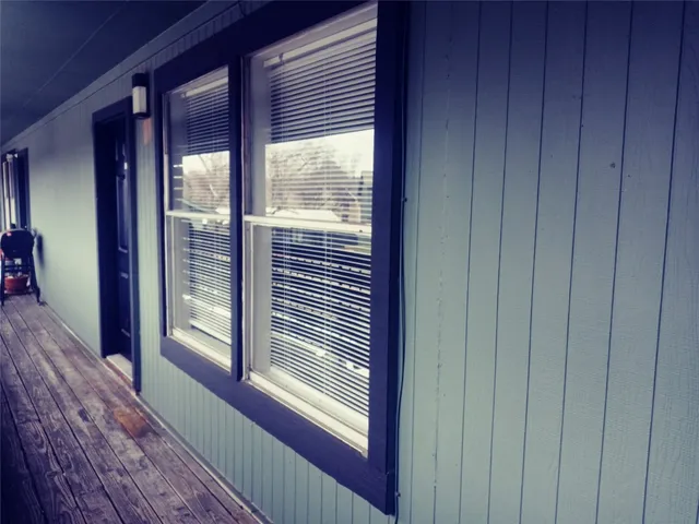 a view of a balcony and window