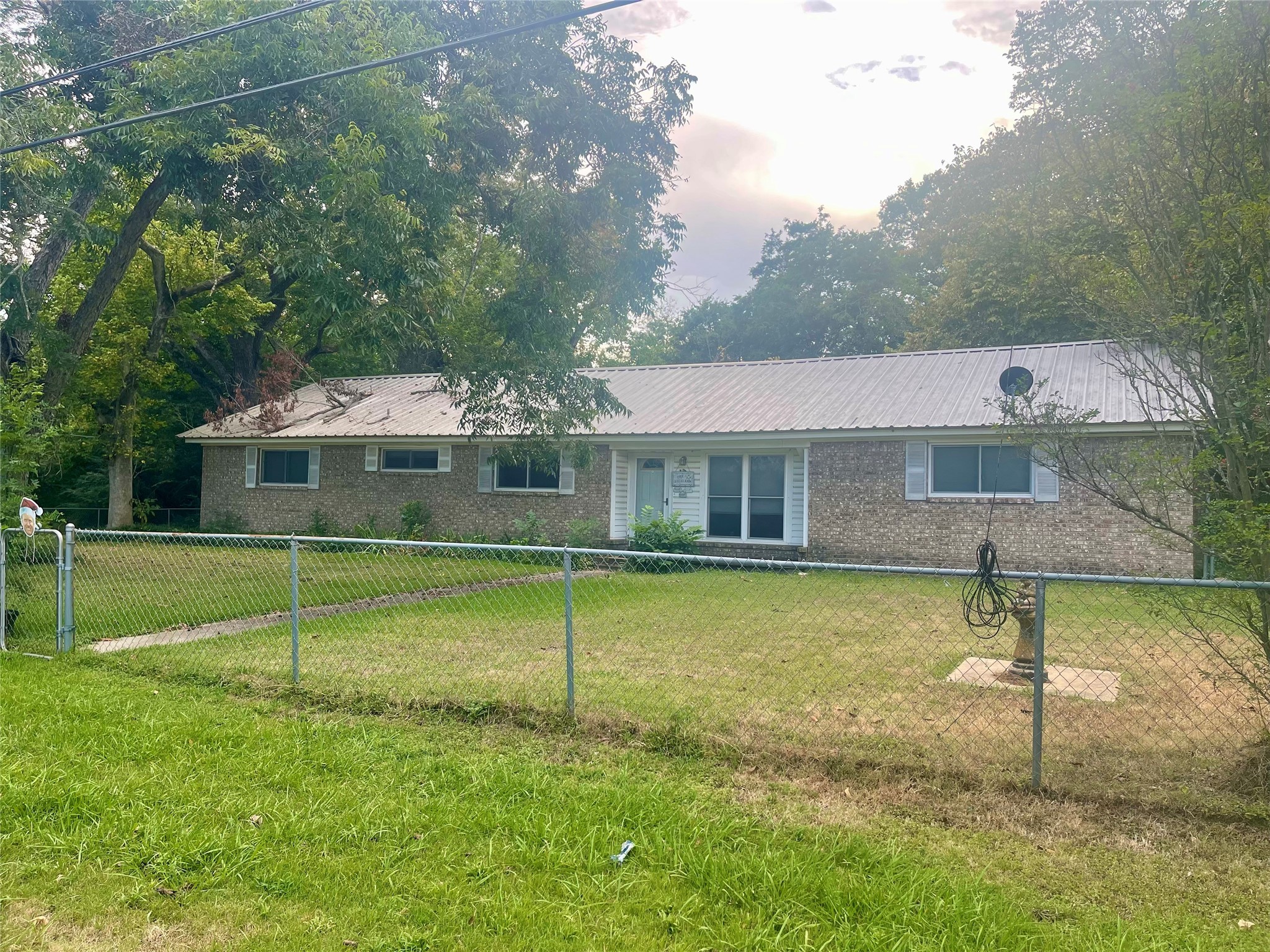 a view of a house with a swimming pool