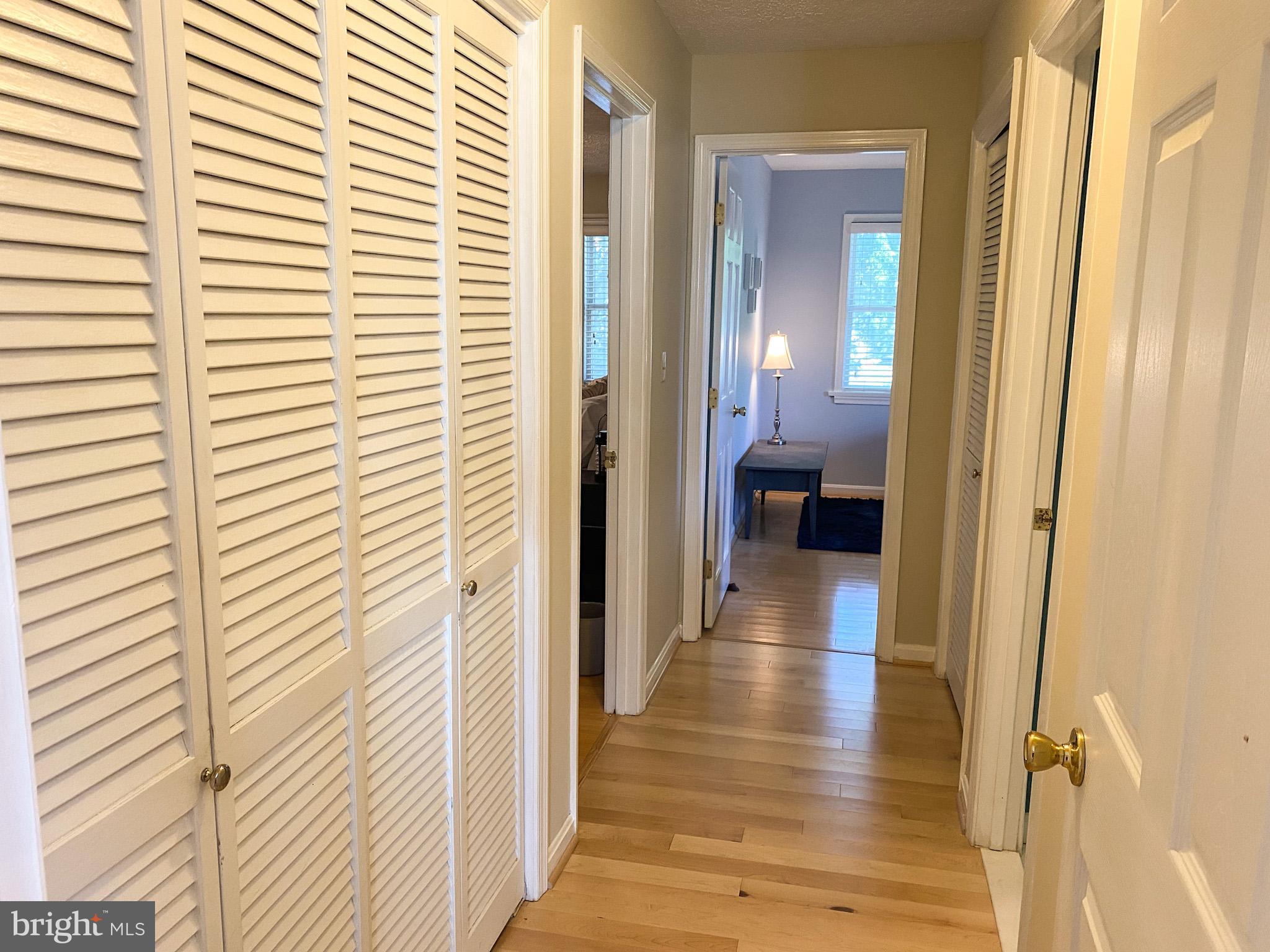 122 East Bay View Drive Annapolis, MD 21403 - Photo 17 of 30 a view of a hallway with wooden floor and a bathroom