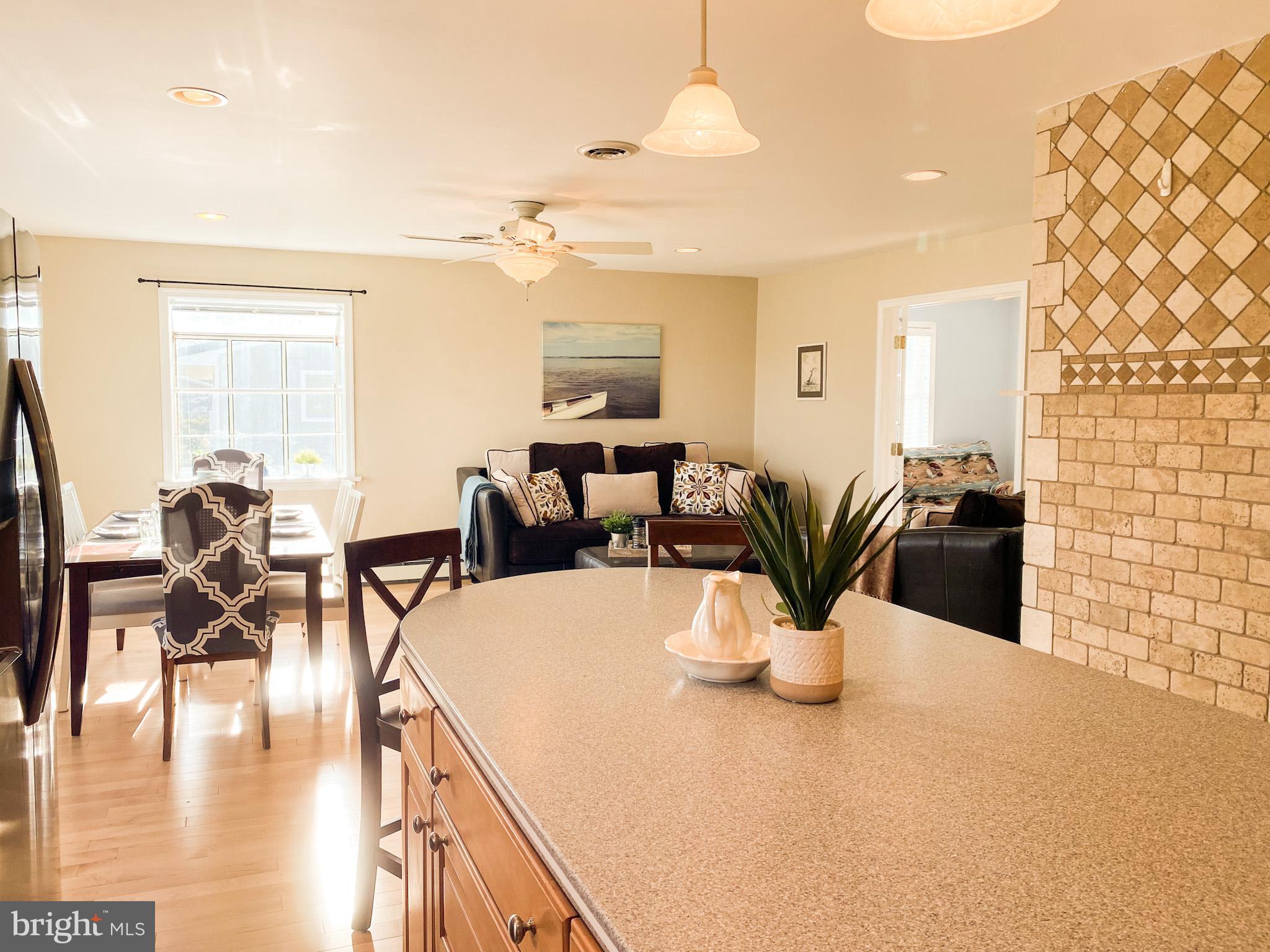 122 East Bay View Drive Annapolis, MD 21403 - Photo 9 of 30 a view of a dining room with furniture and wooden floor