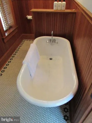 a bathroom with a bathtub