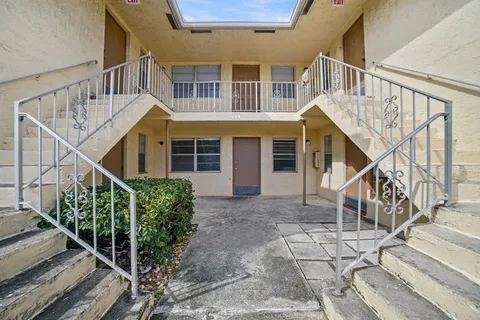 a view of front of house with stairs