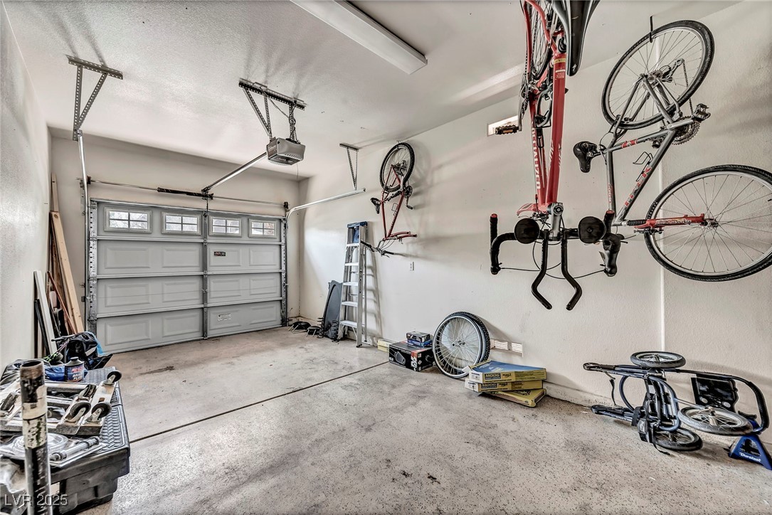 8208 Seven Falls Street North Las Vegas, NV 89085 - Photo 20 of 69 Garage with a garage door opener