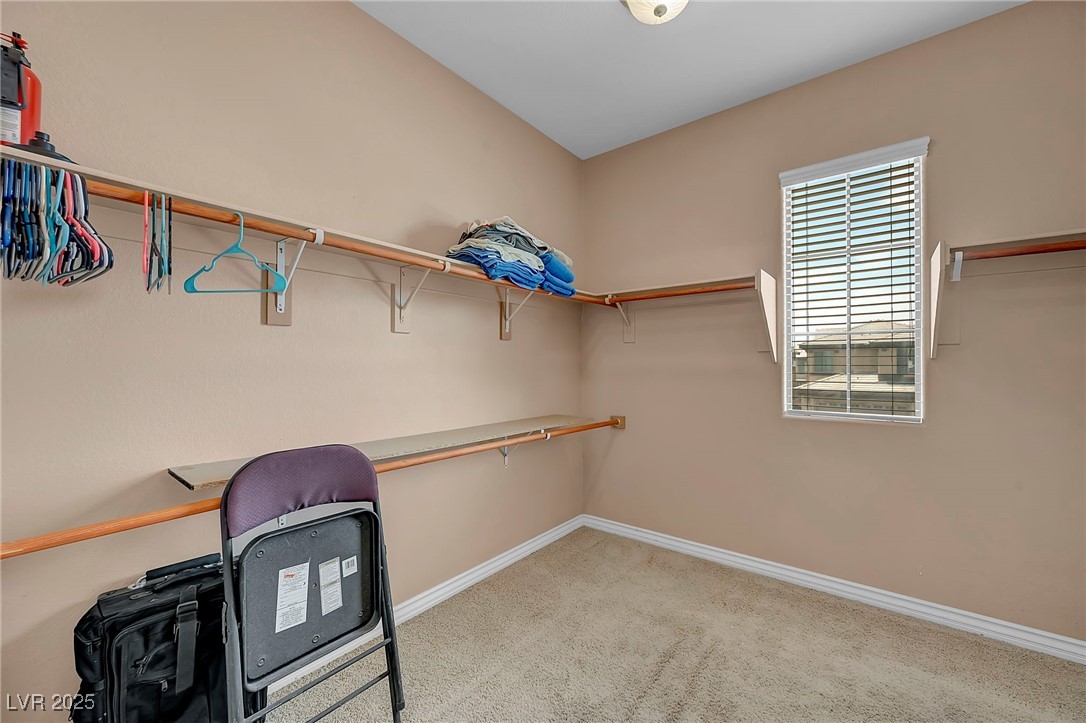 8208 Seven Falls Street North Las Vegas, NV 89085 - Photo 28 of 69 Spacious closet with carpet floors