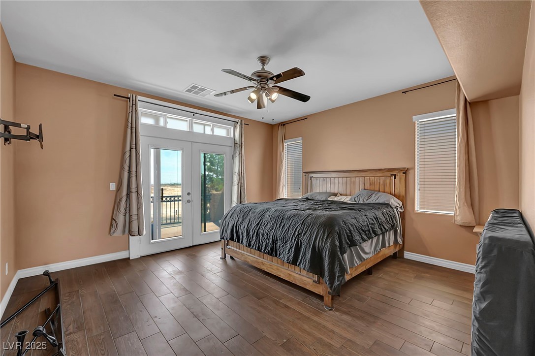 8208 Seven Falls Street North Las Vegas, NV 89085 - Photo 32 of 69 Bedroom with access to outside, wood finished floors, french doors, and a ceiling fan
