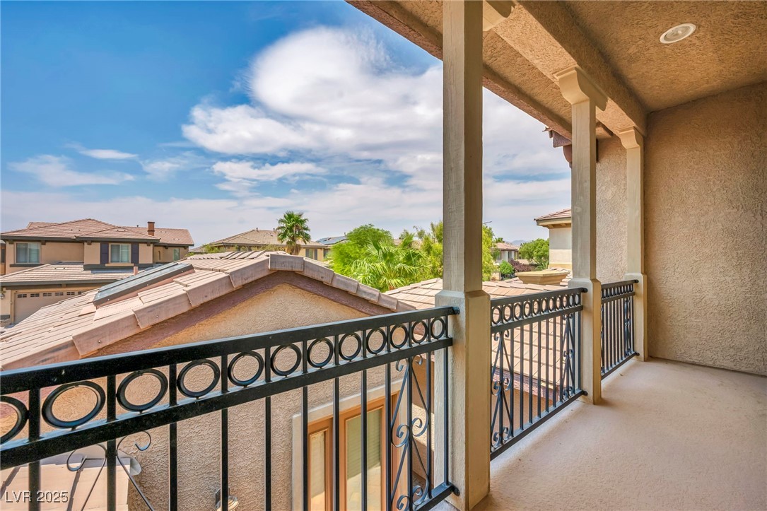 8208 Seven Falls Street North Las Vegas, NV 89085 - Photo 39 of 69 Balcony featuring a residential view