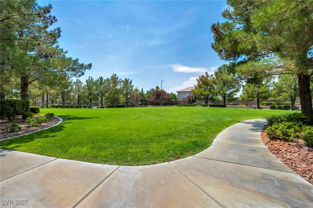 8208 Seven Falls Street North Las Vegas, NV 89085 - Photo 52 of 69 View of community with a lawn