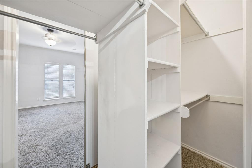 5310 Keller Springs Road, Unit 221 Dallas, TX 75248 - Photo 17 of 29 a view of an empty walk in closet