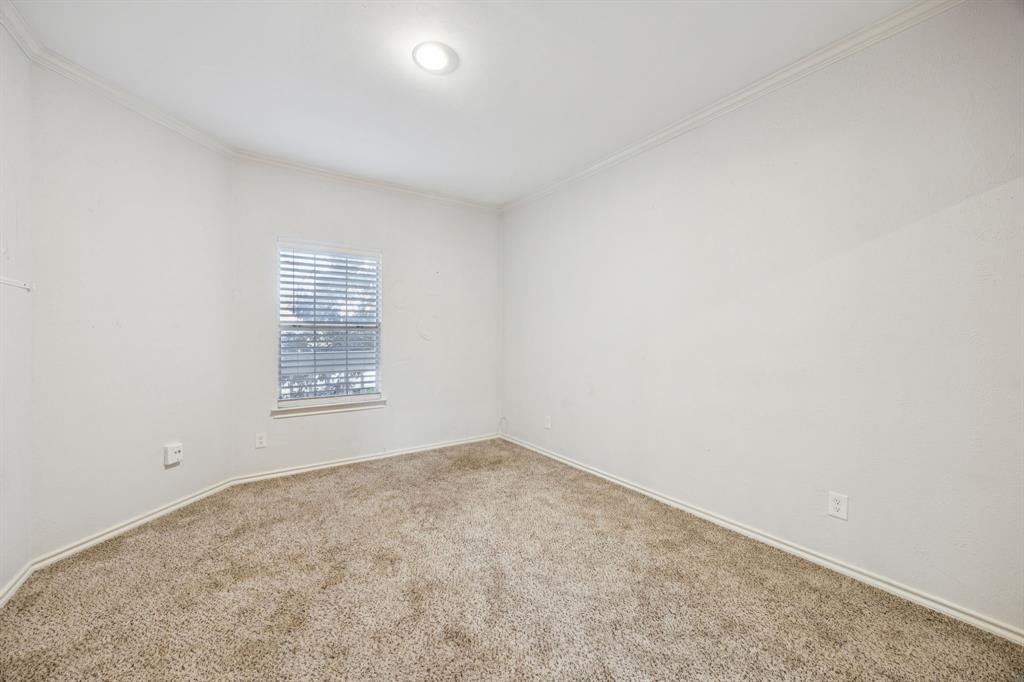 5310 Keller Springs Road, Unit 221 Dallas, TX 75248 - Photo 19 of 29 an empty room with a window