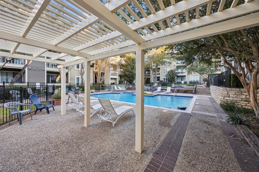 5310 Keller Springs Road, Unit 221 Dallas, TX 75248 - Photo 27 of 29 a view of a swimming pool with a patio