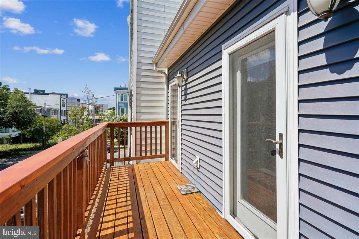 1203 Staples Street Northeast Washington, DC 20002 - Photo 26 of 51 Sunny balcony with scenic views.