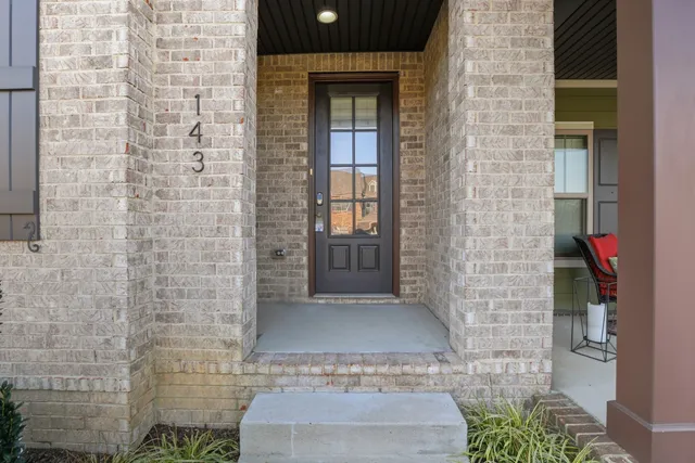 a view of entryway with a door