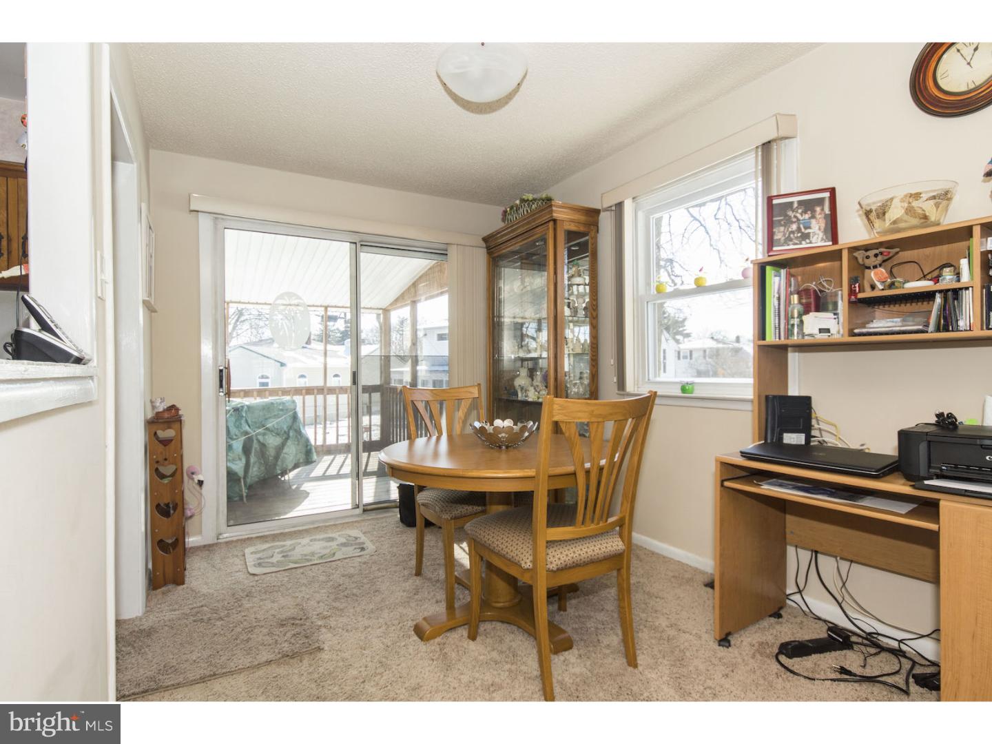 1206 Providence Road Secane, PA 19018 - Photo 8 of 21 a dining room with furniture and a floor to ceiling window