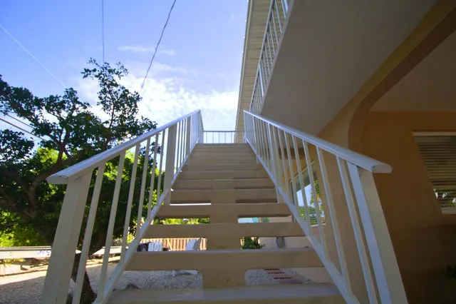 a room with furniture and a flat screen tv